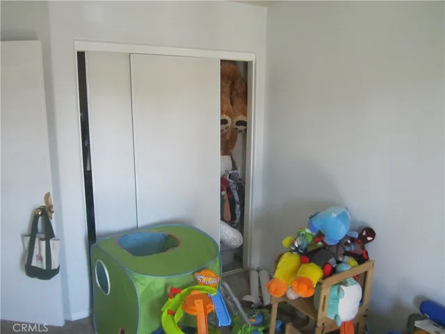 a room with toys and a window