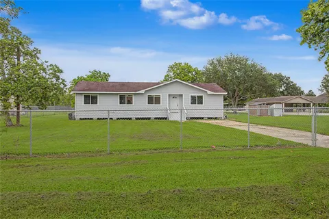 a house view with a garden space