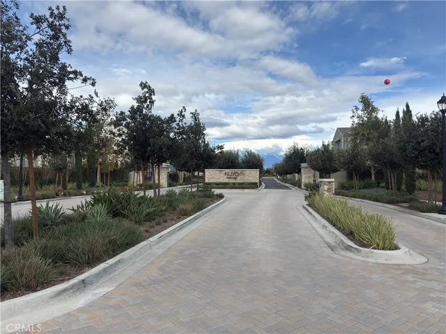 a view of city street with a building in the background
