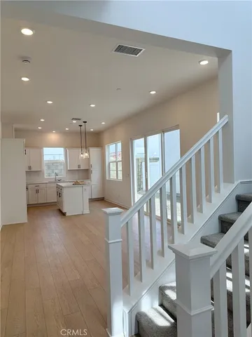 a view of a living room with a large window
