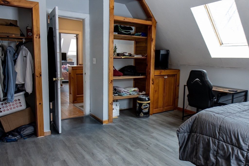 20 Paige Hill Road Brimfield, MA 01010 - Photo 39 of 40 a view of walk in closet with clothes and shoes