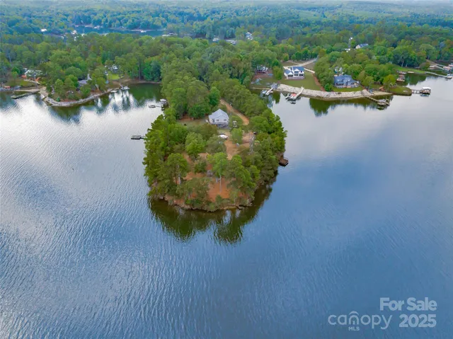 a view of a balcony with mountain view and wooden floor