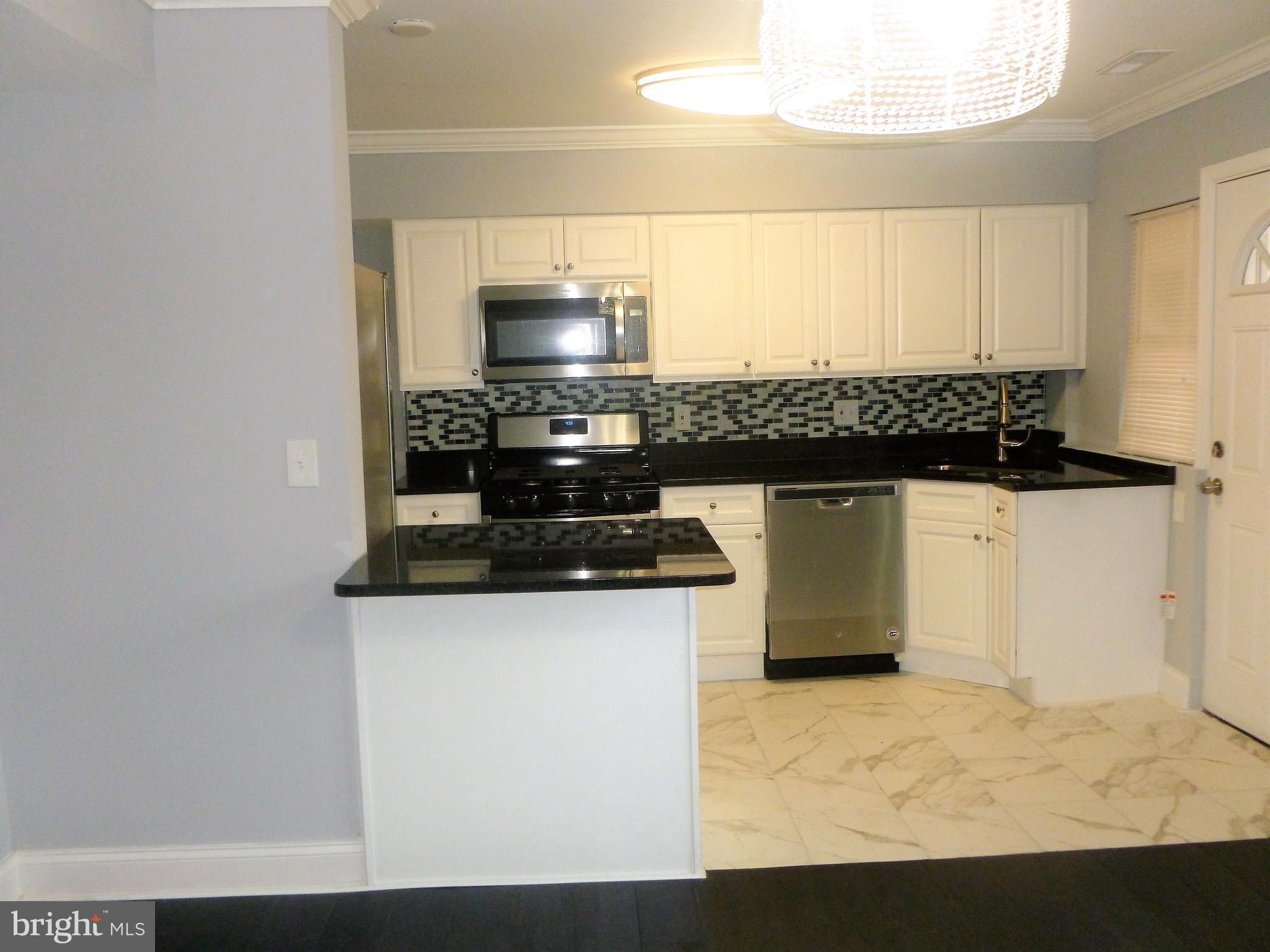 4224 Colborne Road Baltimore, MD 21229 - Photo 12 of 49 Updated kitchen with all new appliances