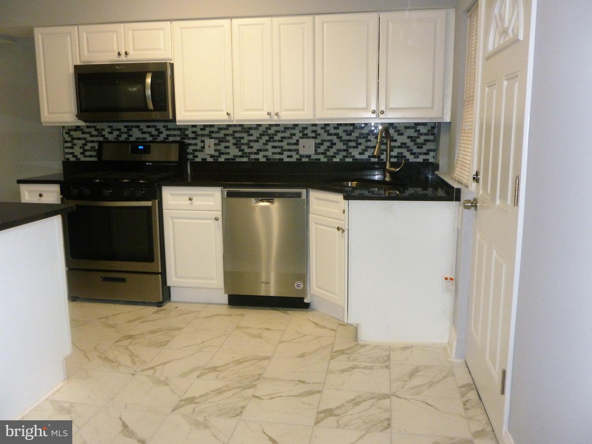 4224 Colborne Road Baltimore, MD 21229 - Photo 15 of 49 Kitchen,with new ceramic floor