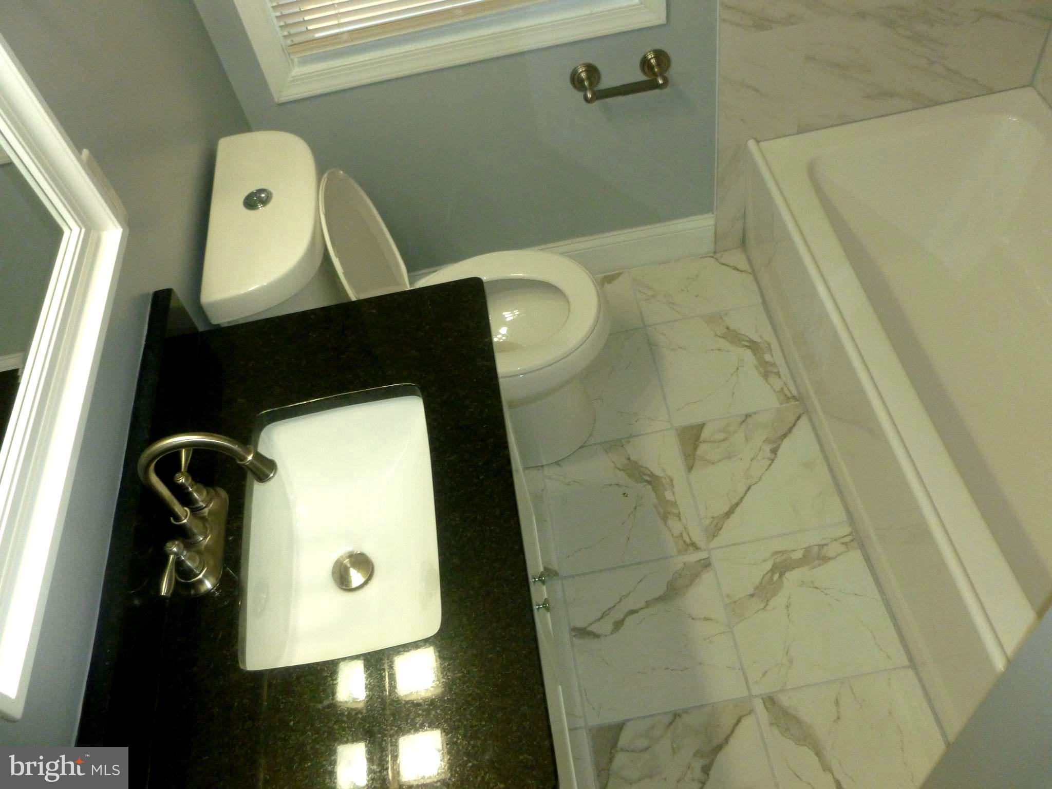4224 Colborne Road Baltimore, MD 21229 - Photo 24 of 49 Renovated bathroom