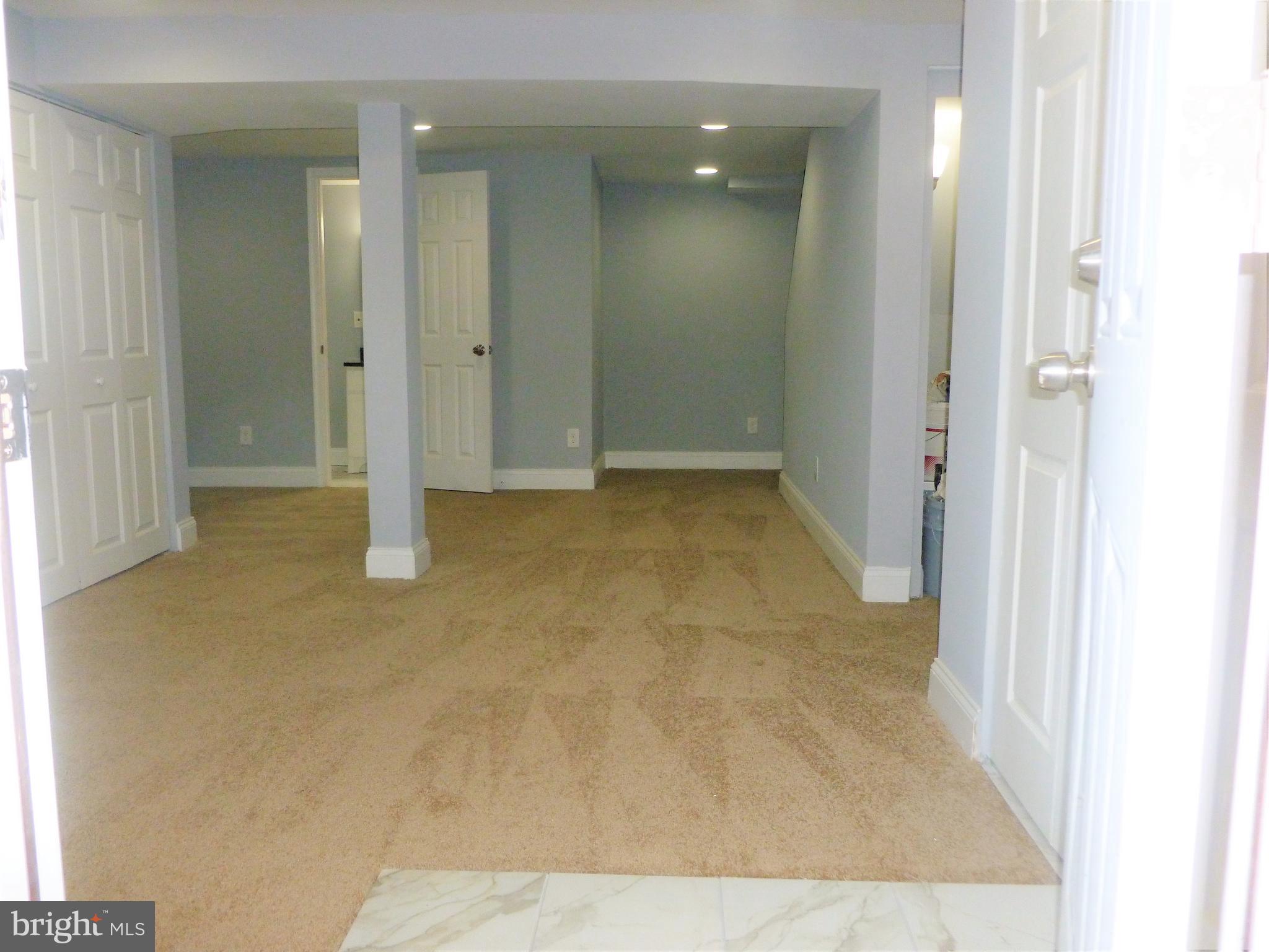 4224 Colborne Road Baltimore, MD 21229 - Photo 43 of 49 Recreation room with recess lighting /new carpet
