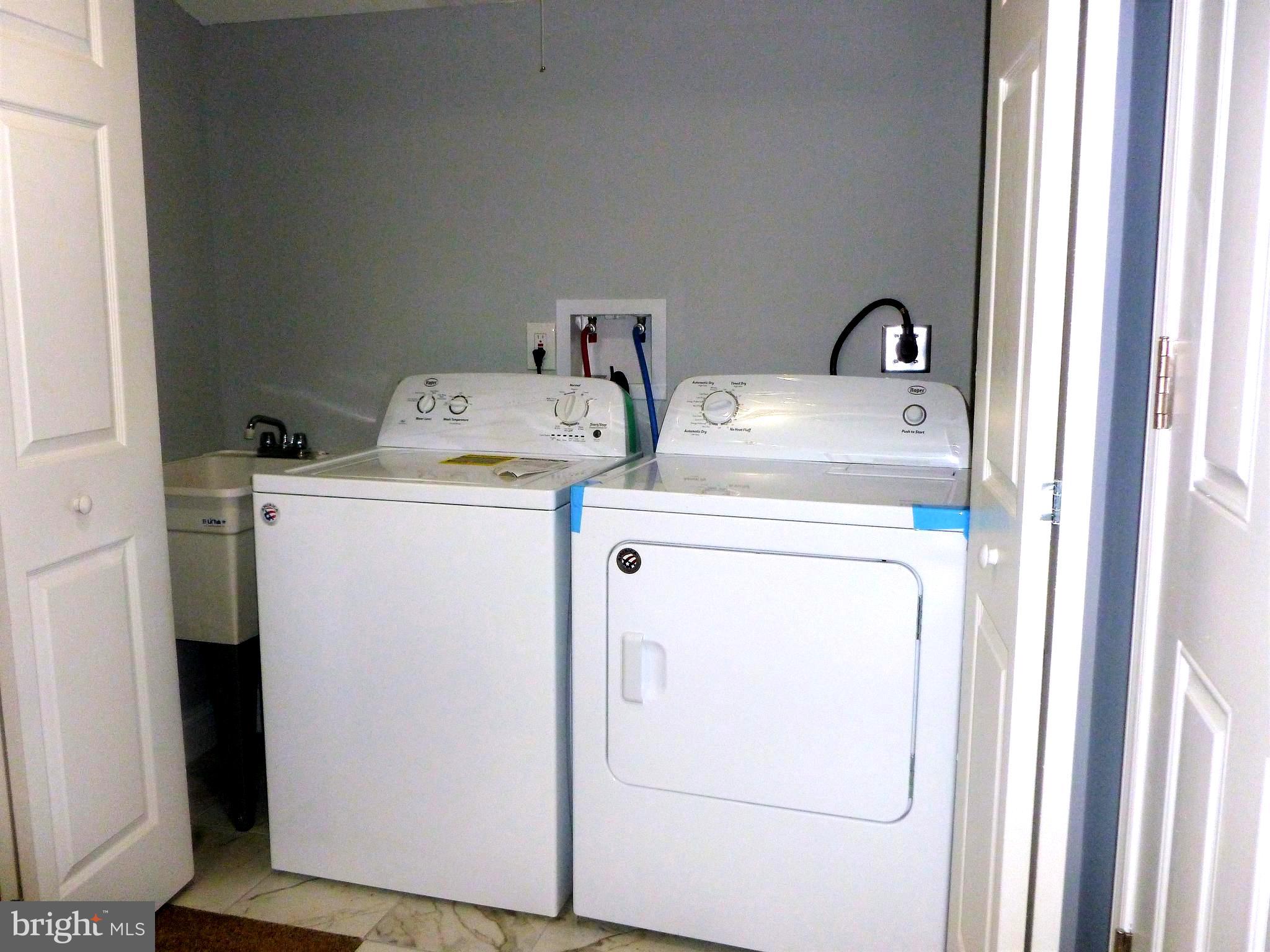 4224 Colborne Road Baltimore, MD 21229 - Photo 44 of 49 Laundry room with new W/D in basement