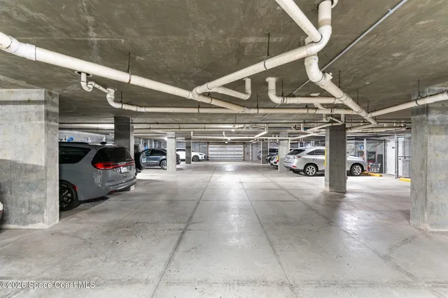 view of building with an outdoor space and seating