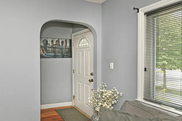 a view of entryway with wooden floor