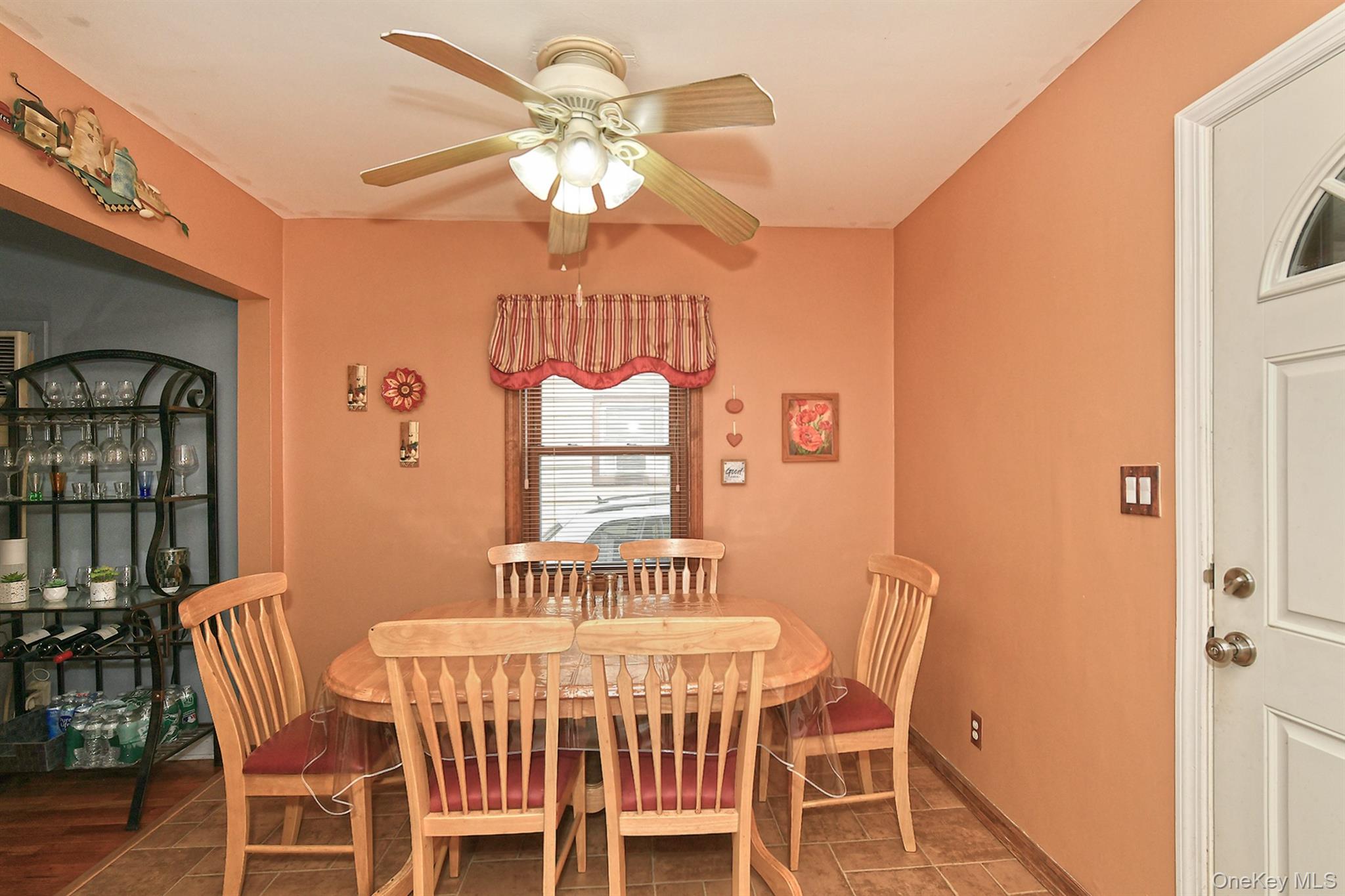 63-05 138th Street Queens, NY 11367 - Photo 8 of 22 Dining space with a ceiling fan and baseboards