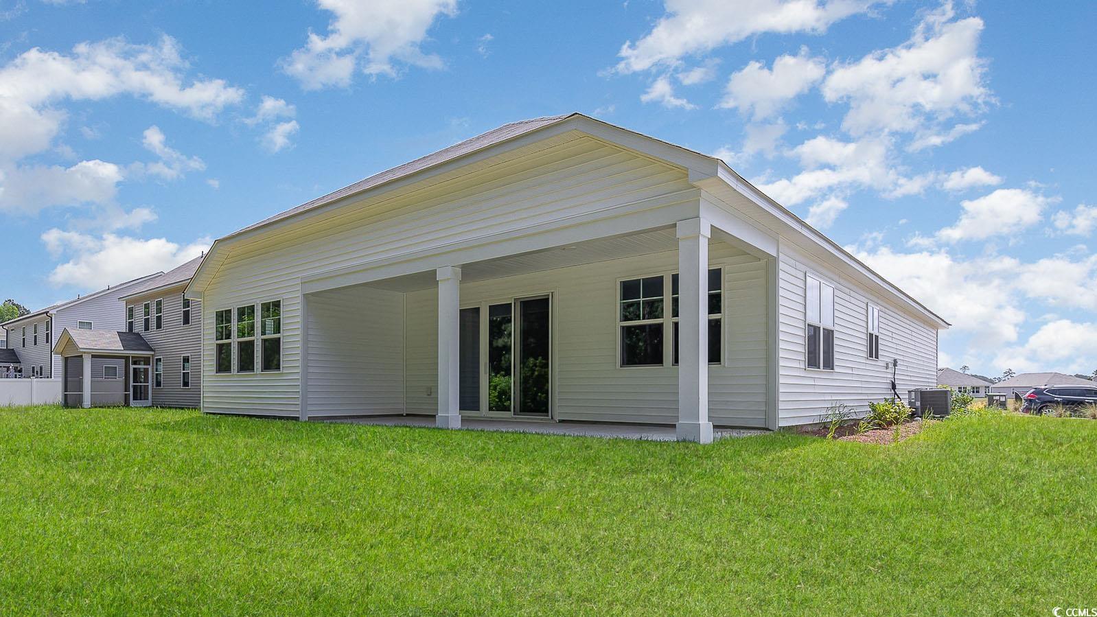 609 Glens Way Conway, SC 29526 - Photo 2 of 36 Back of property featuring a lawn