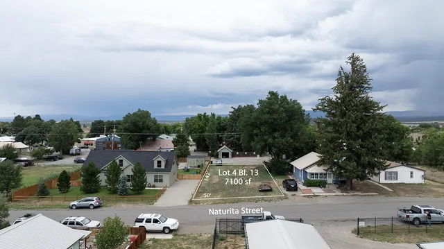 a view of multiple houses with outdoor space