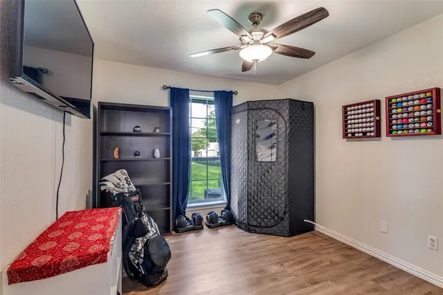 a view of a livingroom with furniture and closet
