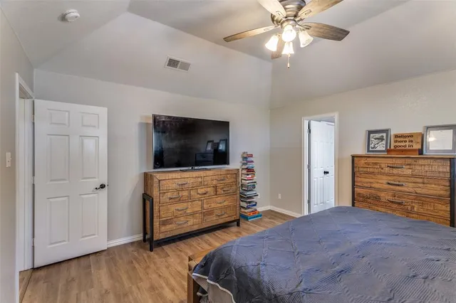 a bedroom with a bed and furniture