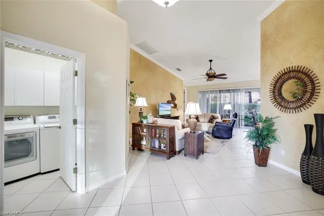 a view of living room kitchen with furniture and stove