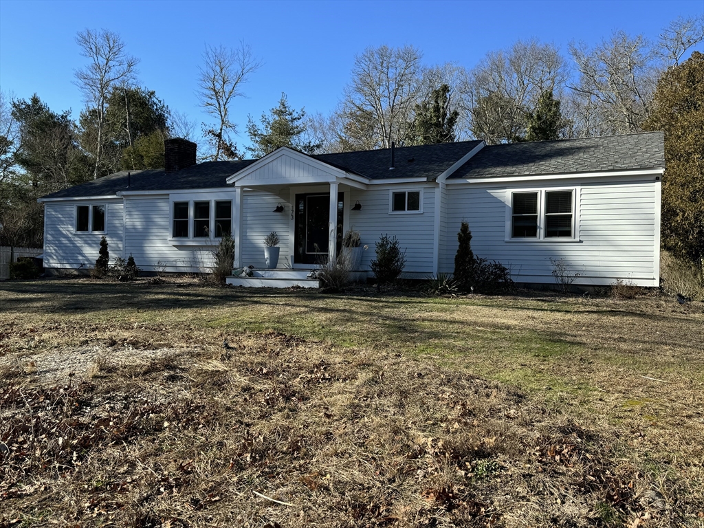 a front view of house with yard space