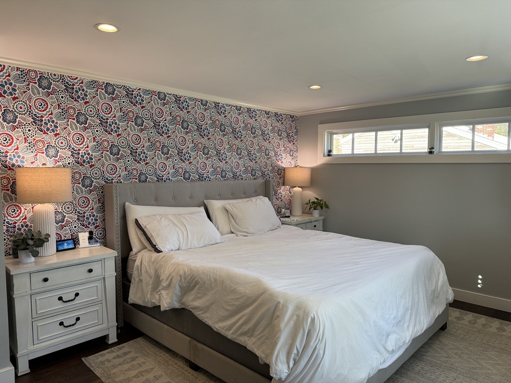 173 Guildford Road Barnstable, MA 02632 - Photo 20 of 26 a bedroom with a bed and a dresser