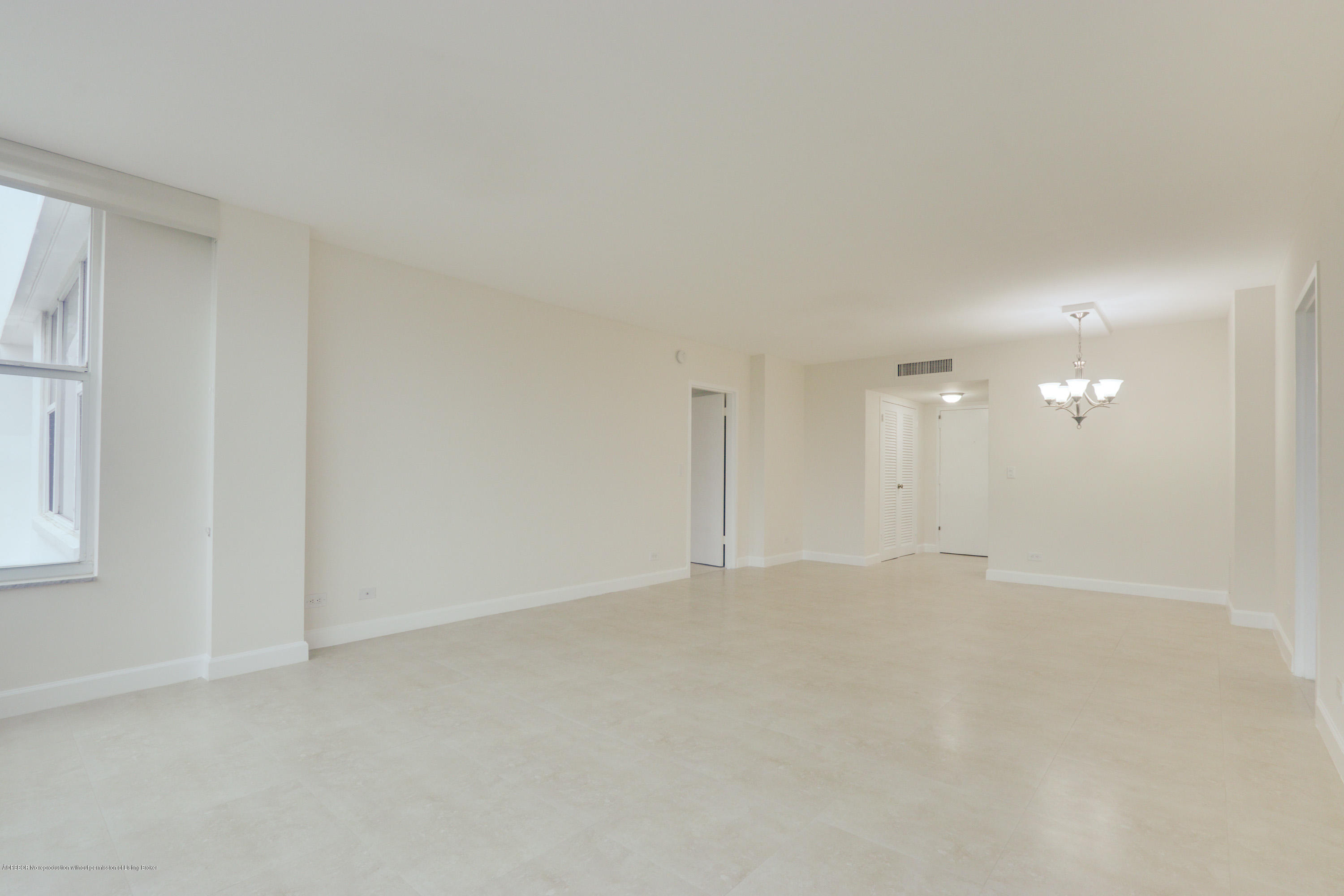 333 Sunset Avenue, Unit 308 Palm Beach, FL 33480 - Photo 11 of 29 an empty room with windows
