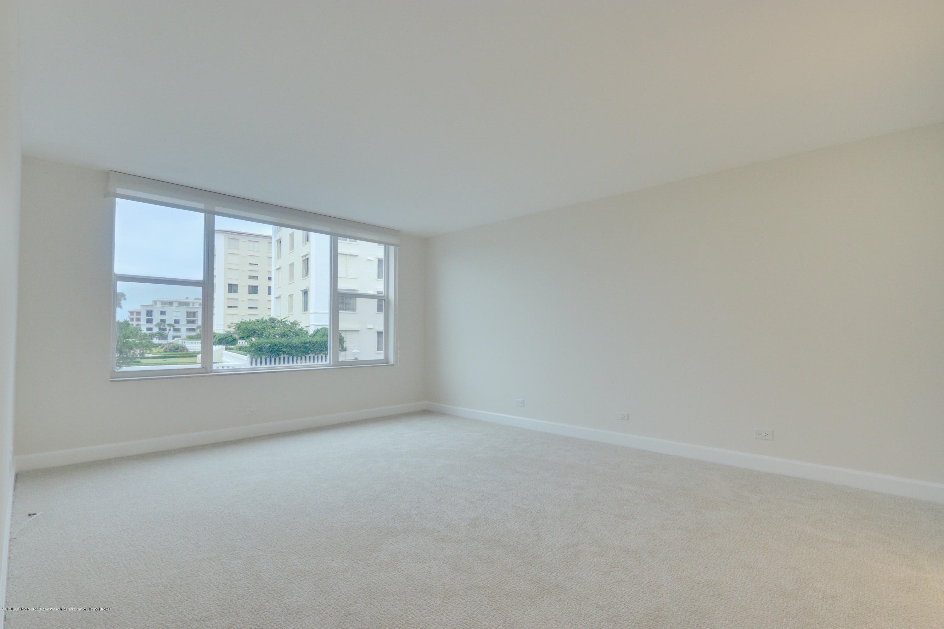 333 Sunset Avenue, Unit 308 Palm Beach, FL 33480 - Photo 12 of 29 an empty room with windows