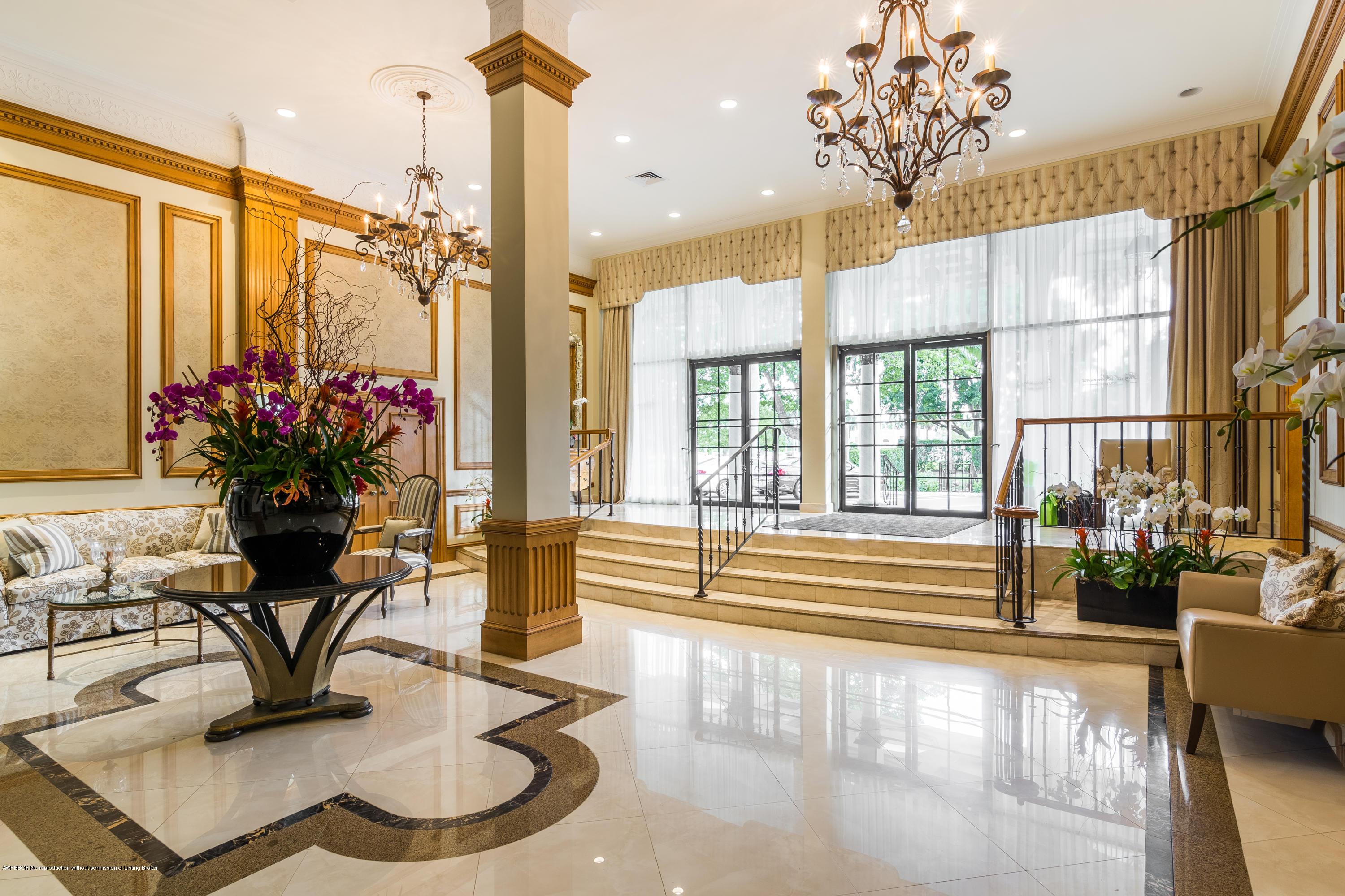333 Sunset Avenue, Unit 308 Palm Beach, FL 33480 - Photo 5 of 29 a dining room with furniture and a chandelier