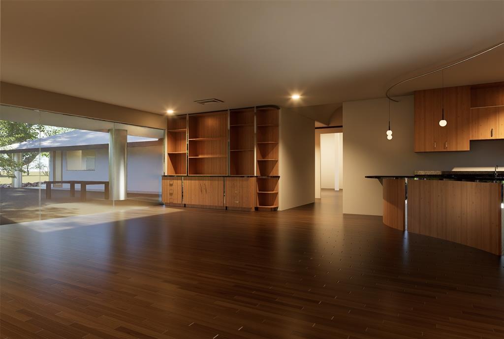 4301 Briarhaven Road Fort Worth, TX 76109 - Photo 11 of 40 a view of empty room with wooden floor and kitchen