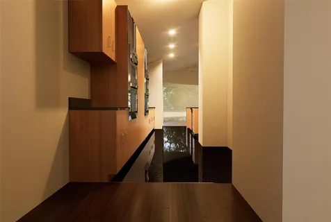 a view of a house with backyard sitting area and garden