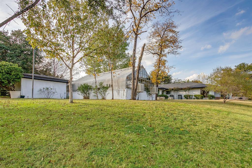 4301 Briarhaven Road Fort Worth, TX 76109 - Photo 16 of 40 a big yard with large trees and a big yard