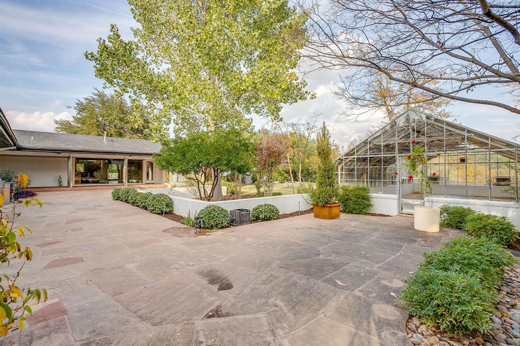 4301 Briarhaven Road Fort Worth, TX 76109 - Photo 18 of 40 a view of a house with a large tree