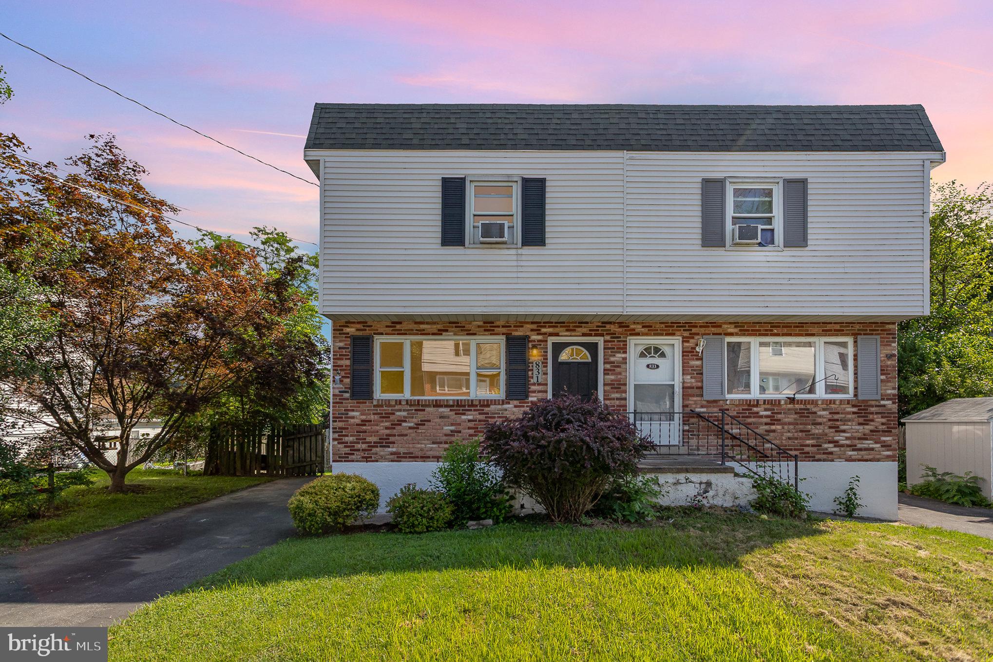 831 Erford Road Camp Hill, PA 17011 - Photo 1 of 36 a front view of a house with garden