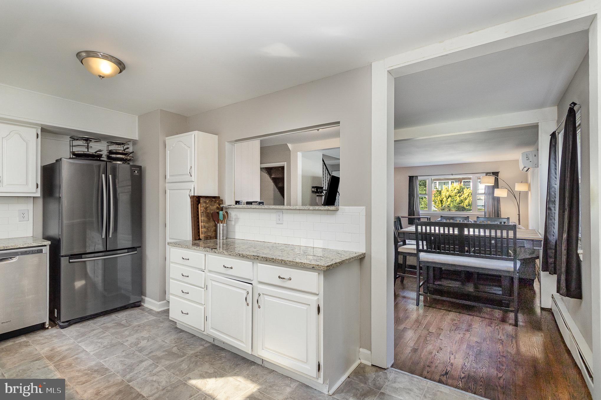 831 Erford Road Camp Hill, PA 17011 - Photo 13 of 36 a kitchen with white cabinets and refrigerator