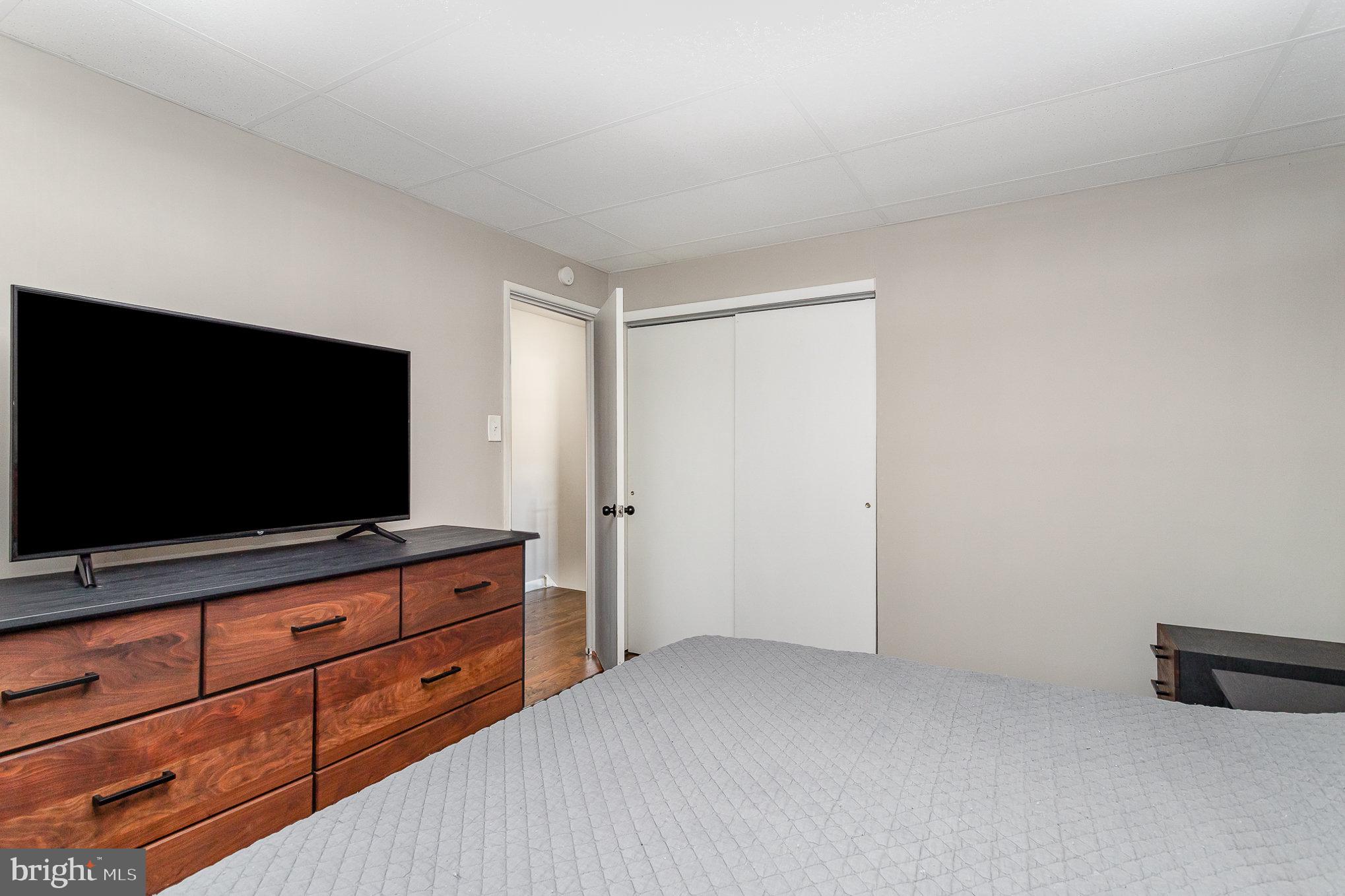 831 Erford Road Camp Hill, PA 17011 - Photo 16 of 36 a room with furniture and flat screen tv