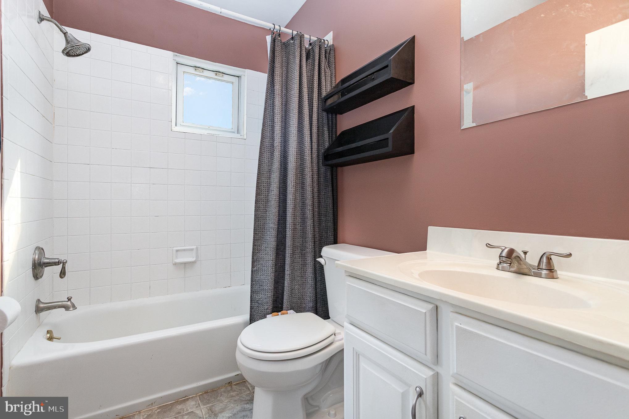831 Erford Road Camp Hill, PA 17011 - Photo 17 of 36 a bathroom with a sink a toilet and bathtub
