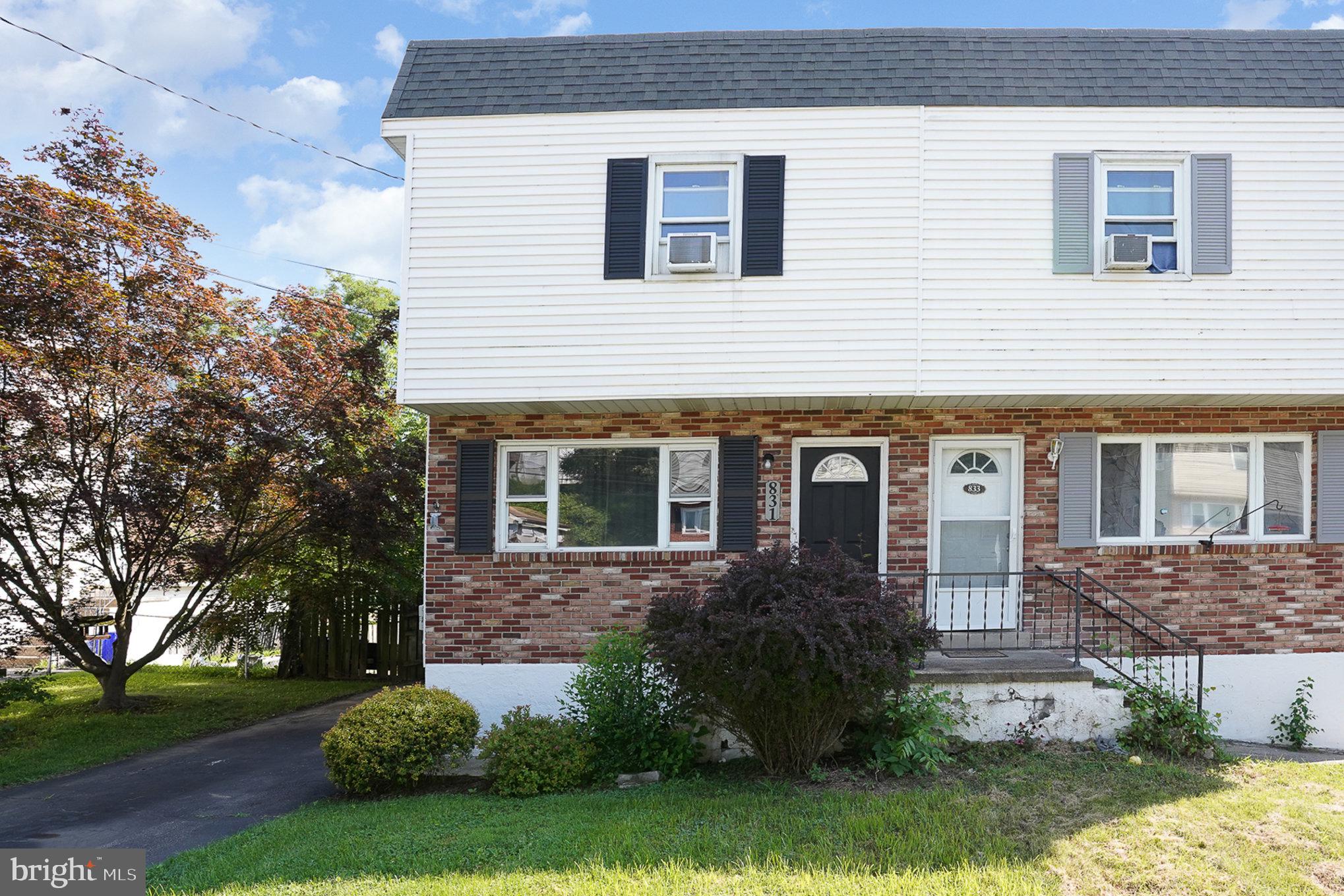 831 Erford Road Camp Hill, PA 17011 - Photo 3 of 36 a front view of a house with garden