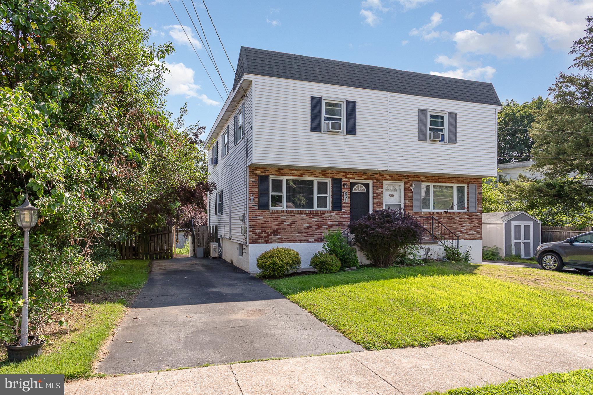 831 Erford Road Camp Hill, PA 17011 - Photo 4 of 36 a front view of a house with garden