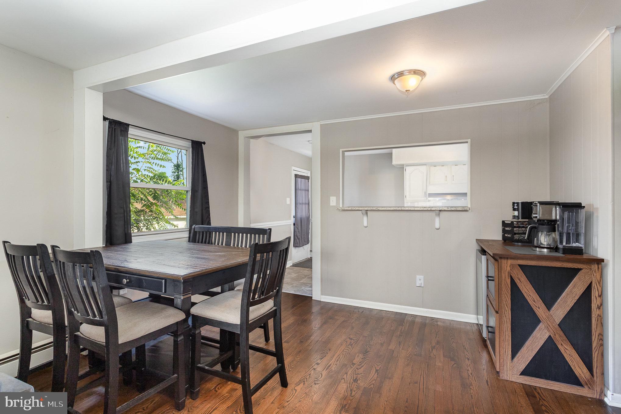 831 Erford Road Camp Hill, PA 17011 - Photo 10 of 36 a view of a dining room with furniture and wooden floor