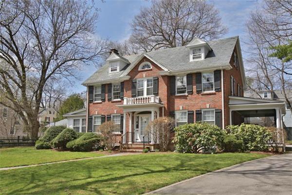 20 Morse Road Newton, MA 02460 - Photo 1 of 11 a front view of a building with garden and trees