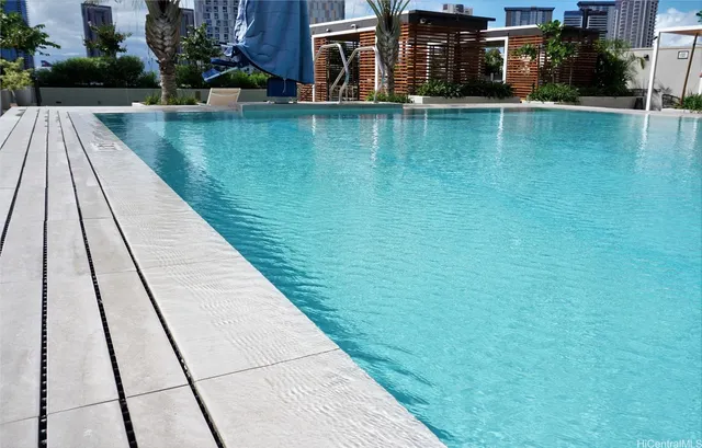 a outdoor living space with furniture and a potted plant