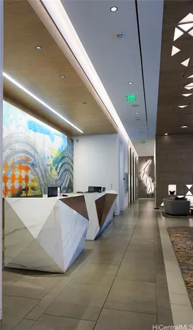 a lobby with furniture and window