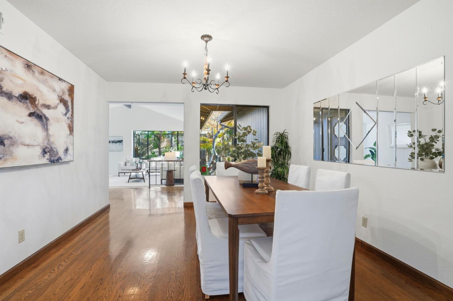 1190 Flying Fish Street Foster City, CA 94404 - Photo 17 of 45 a view of a dining room with furniture window and wooden floor