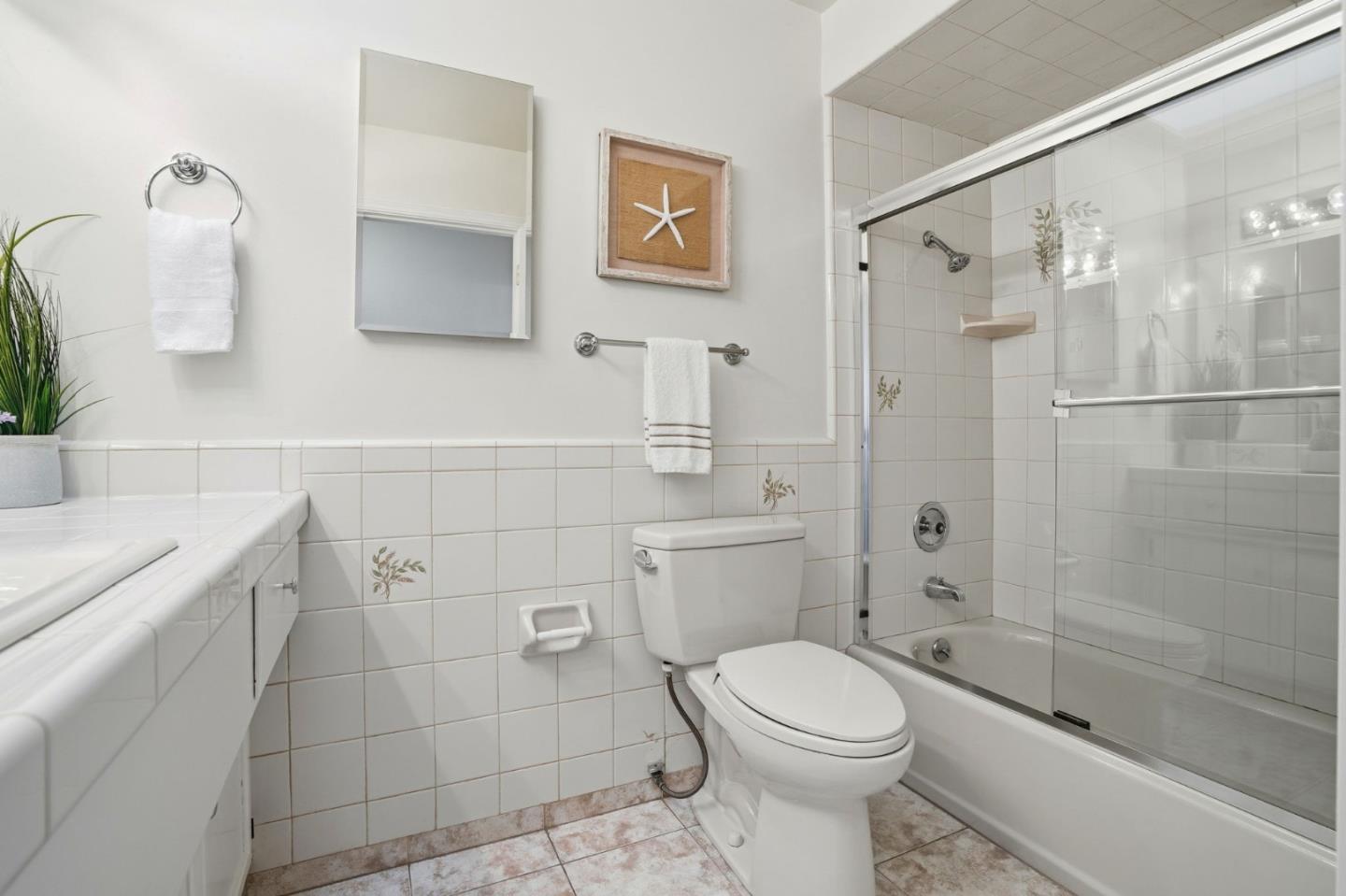 1190 Flying Fish Street Foster City, CA 94404 - Photo 36 of 45 a bathroom with a toilet sink and shower