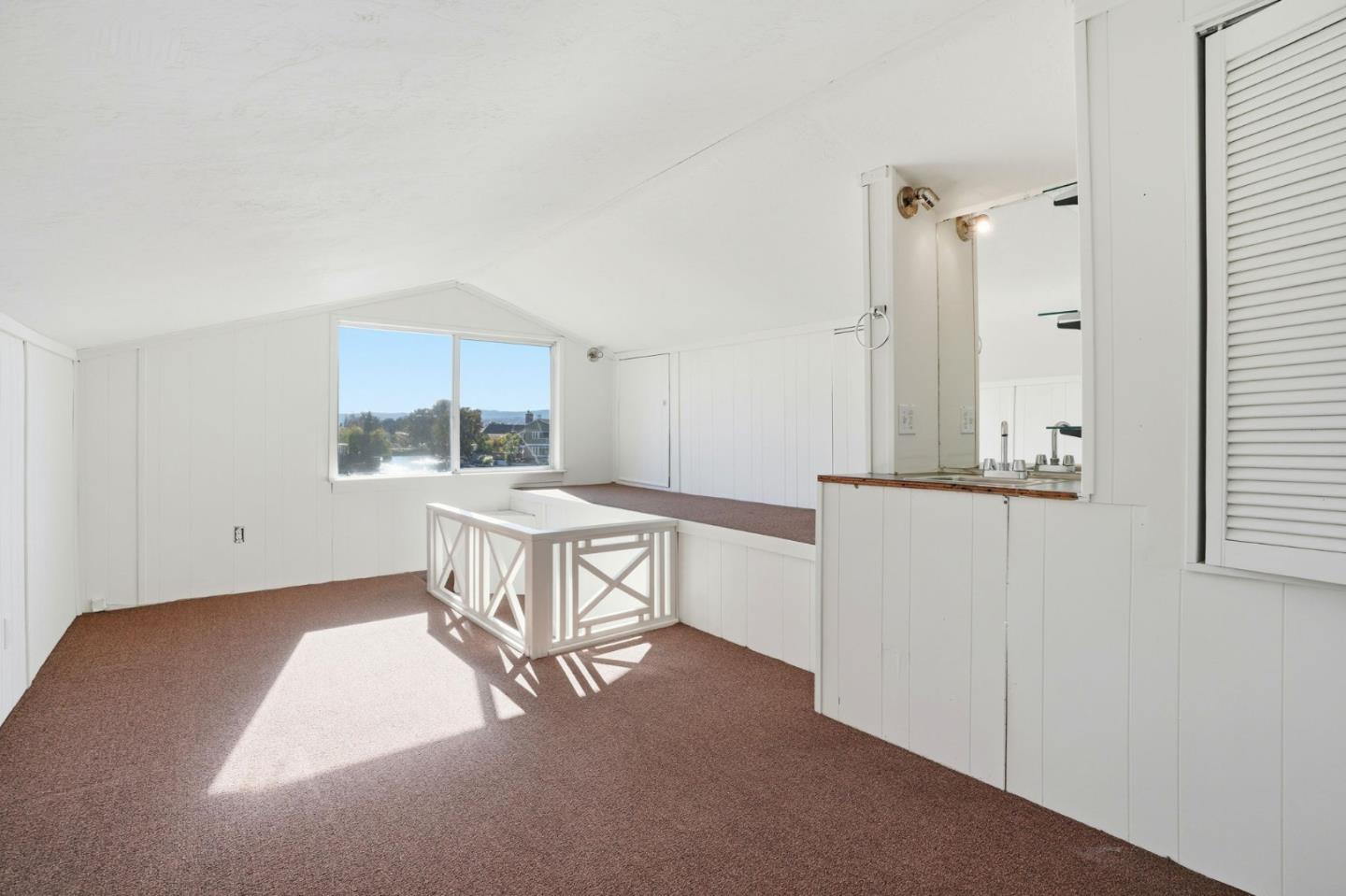 1190 Flying Fish Street Foster City, CA 94404 - Photo 38 of 45 a kitchen with cabinets and window