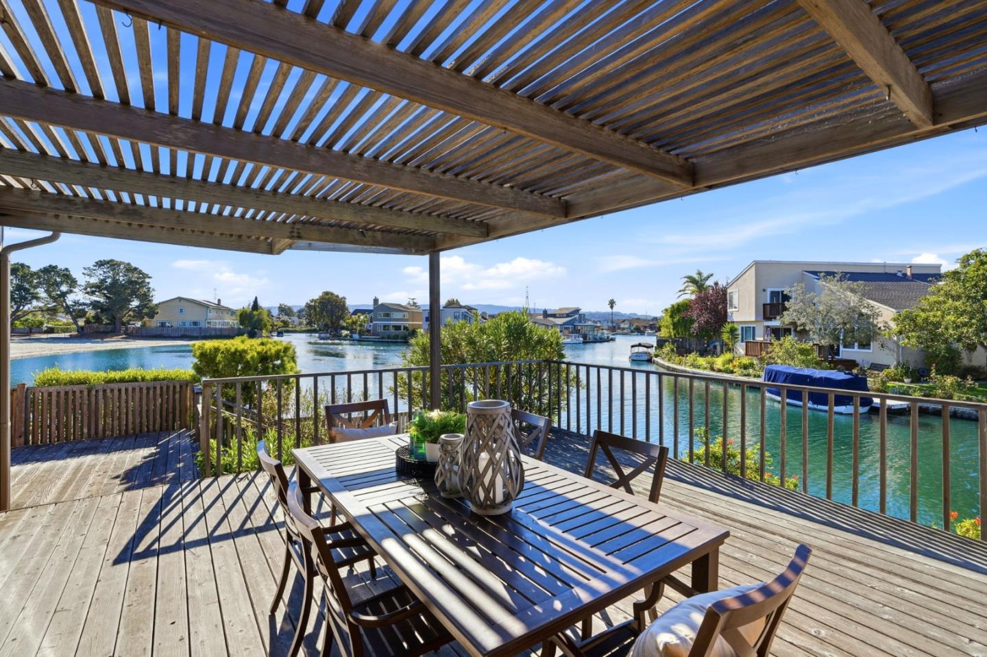 1190 Flying Fish Street Foster City, CA 94404 - Photo 4 of 45 a view of a chairs on wooden deck