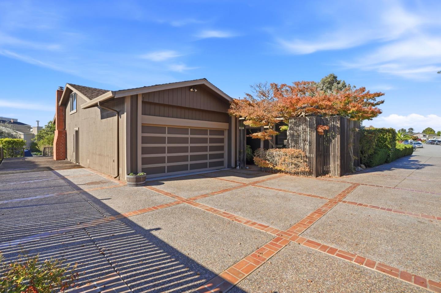 1190 Flying Fish Street Foster City, CA 94404 - Photo 43 of 45 a front view of a house with a yard and garage