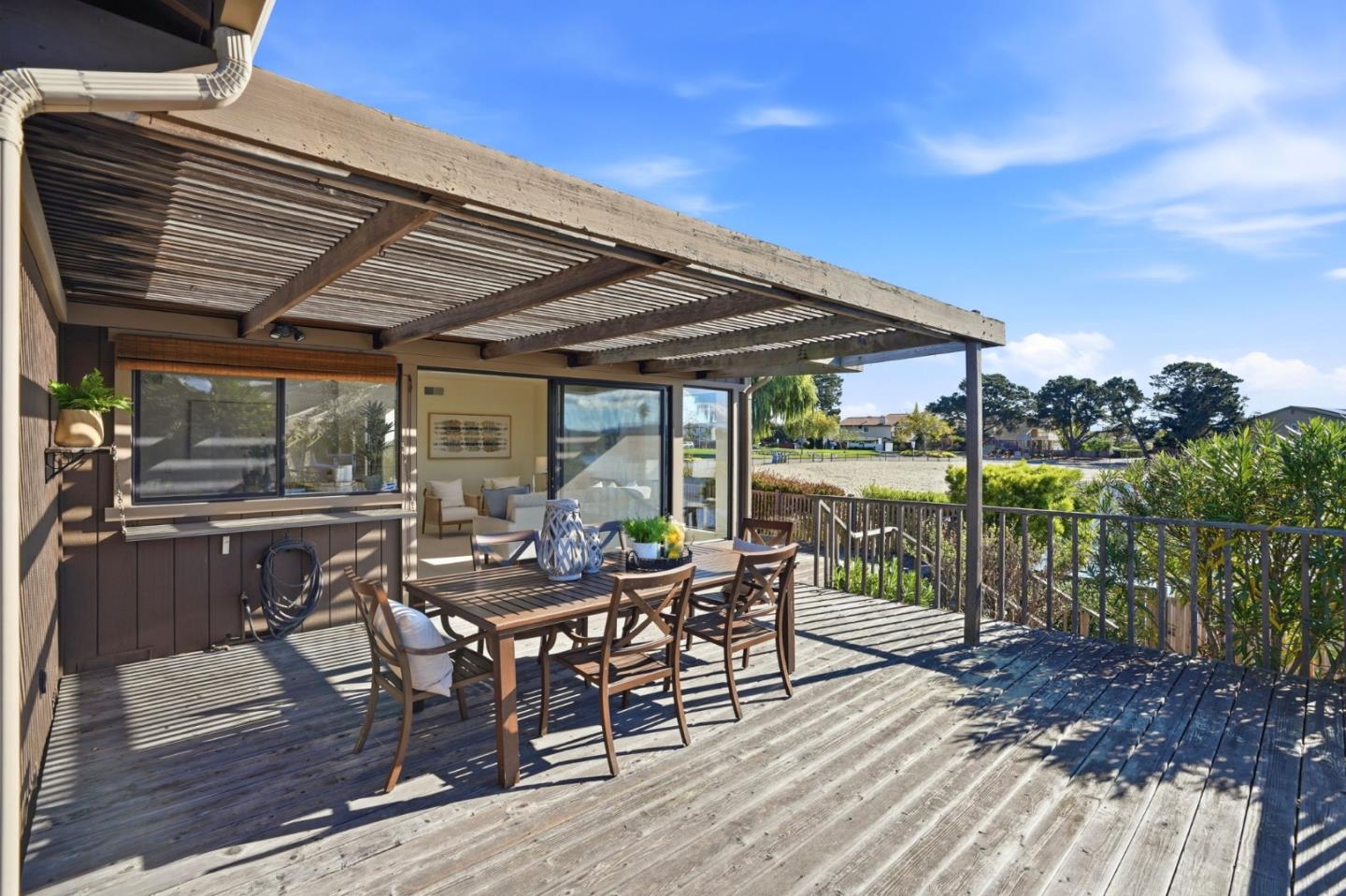 1190 Flying Fish Street Foster City, CA 94404 - Photo 7 of 45 a view of a patio with a table chairs and a backyard