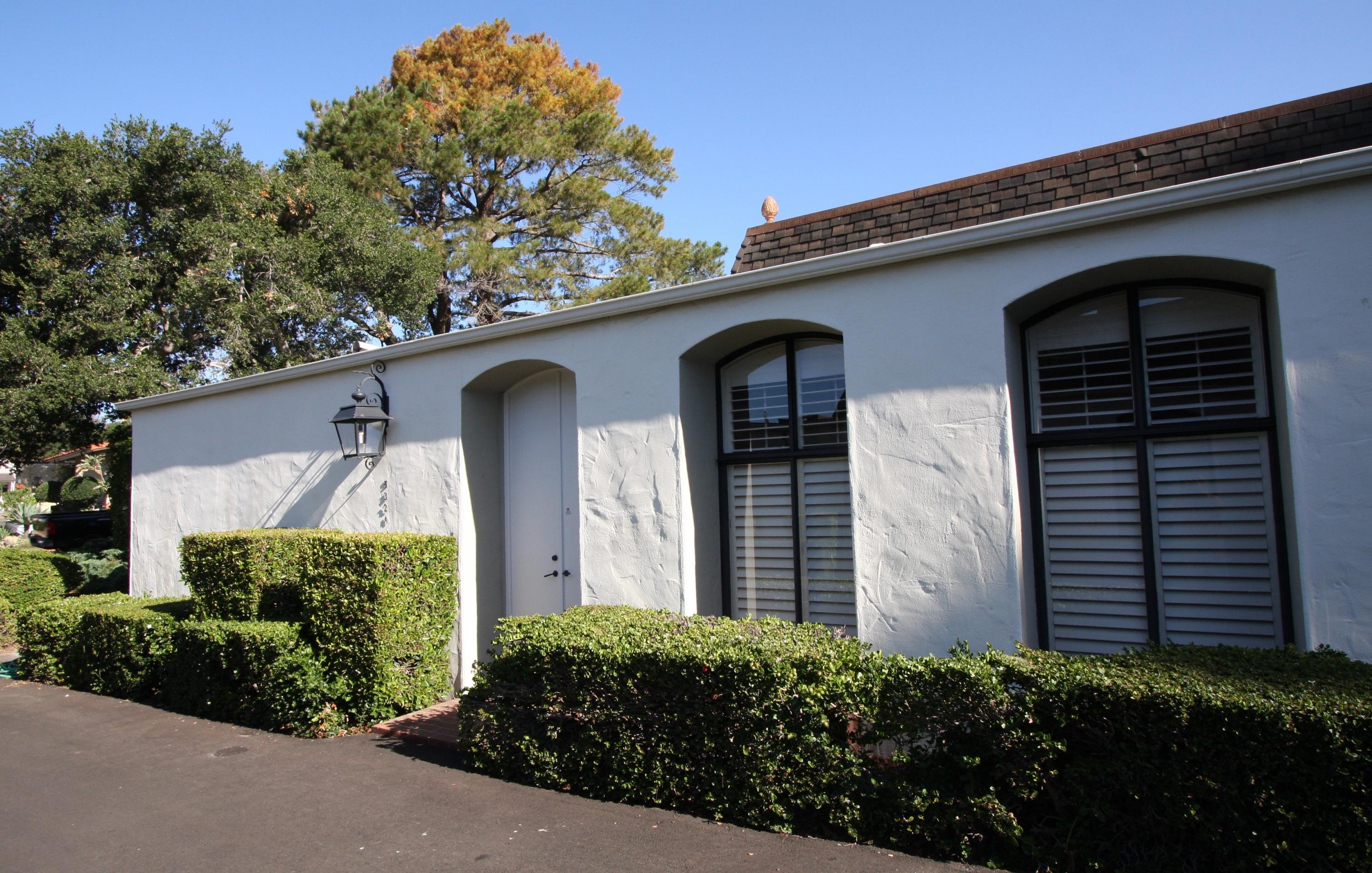 532 San Ysidro Road Santa Barbara, CA 93108 - Photo 1 of 10 a front view of a house with garden