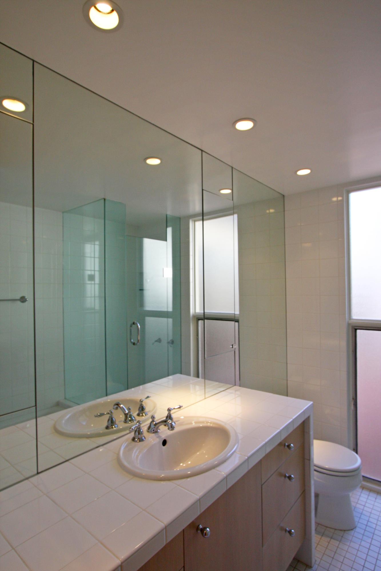 532 San Ysidro Road Santa Barbara, CA 93108 - Photo 8 of 10 a bathroom with a granite countertop sink a toilet and shower