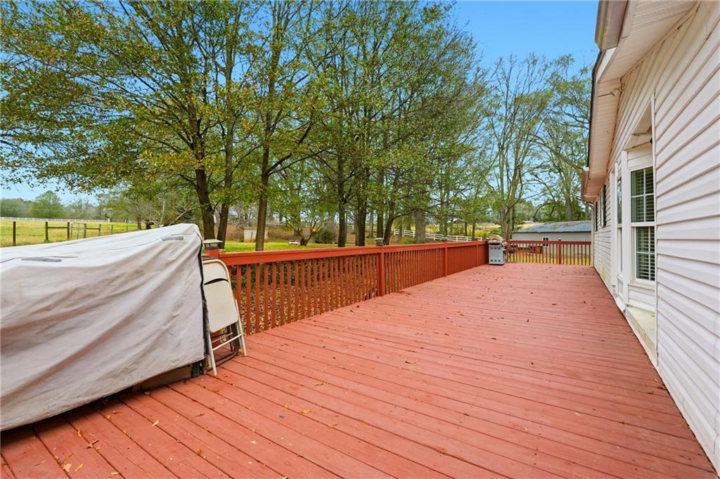 1295 Double Bridges Road Winder, GA 30680 - Photo 29 of 57 a balcony view with a seating space