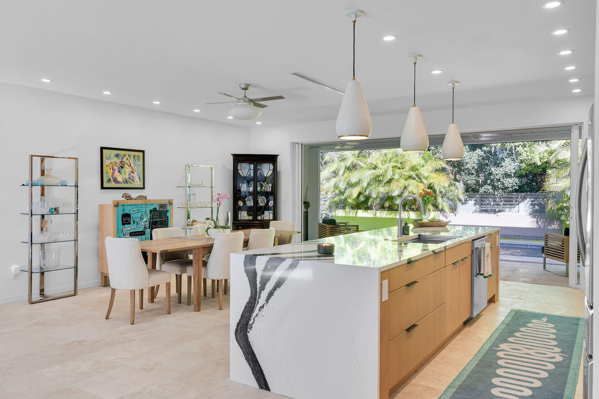 1501 Georgia Street Key West, FL 33040 - Photo 13 of 50 a kitchen with kitchen island a large window in it and kitchen island
