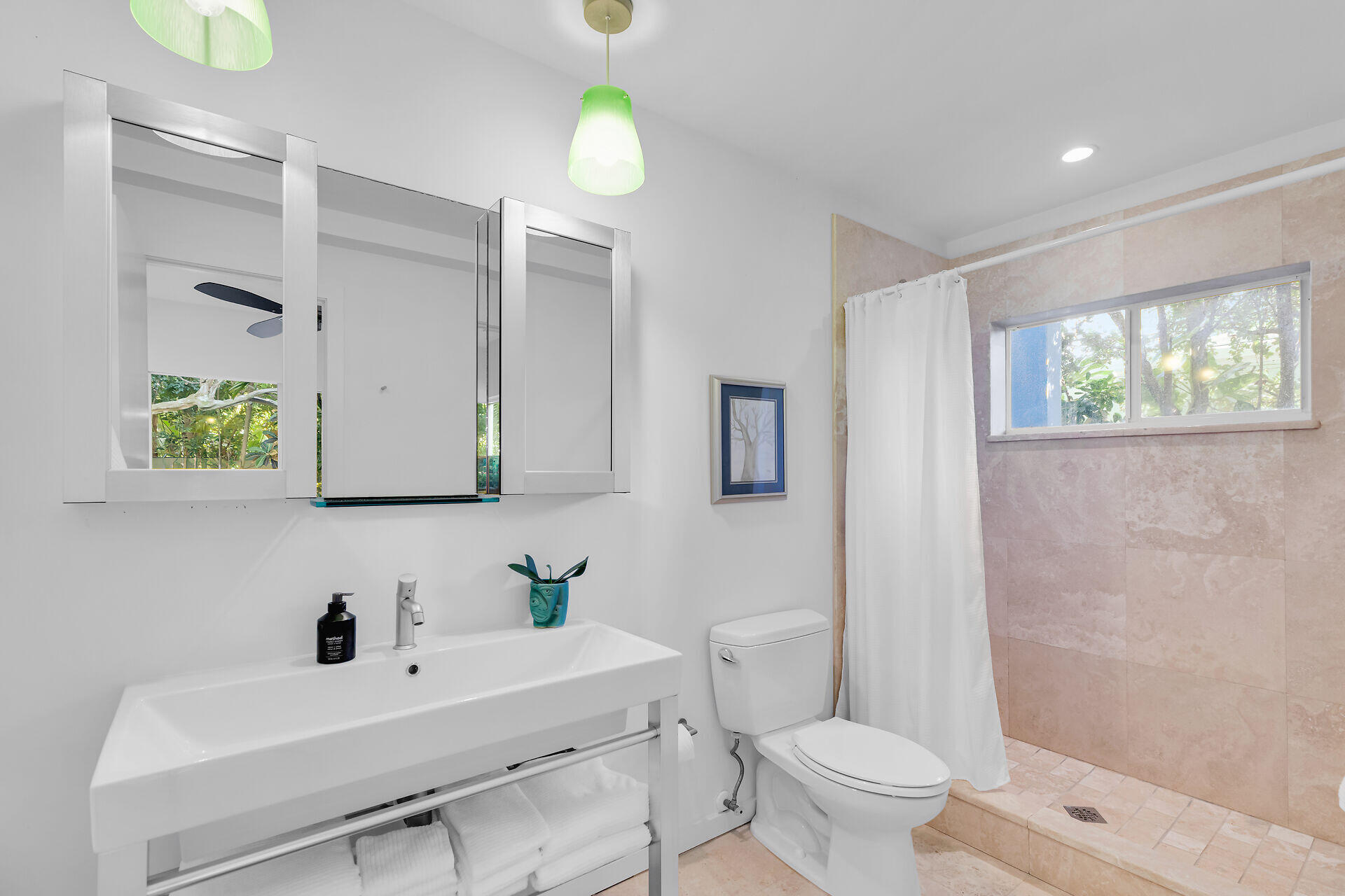 1501 Georgia Street Key West, FL 33040 - Photo 21 of 50 a bathroom with a sink a toilet and a mirror