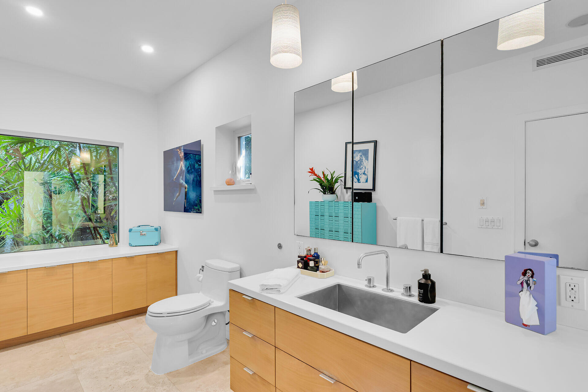 1501 Georgia Street Key West, FL 33040 - Photo 28 of 50 a bathroom with a sink and a large mirror